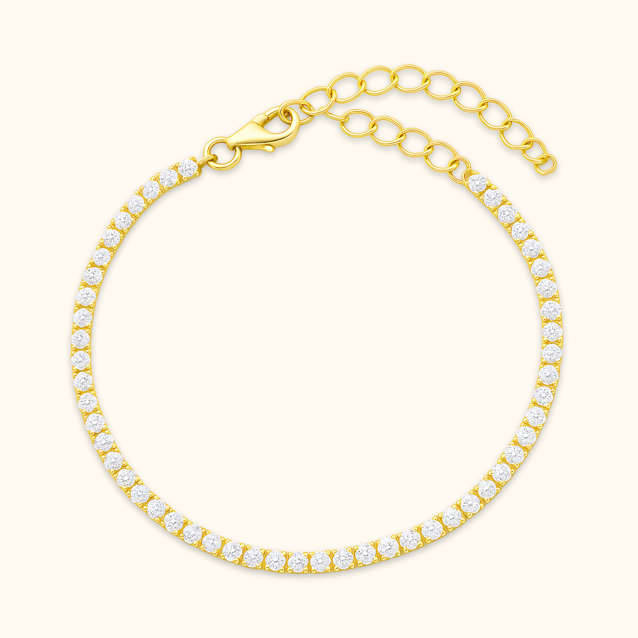 Cubic Zirconia Tennis Bracelet featuring gold vermeil finish and lobster claw closure.
