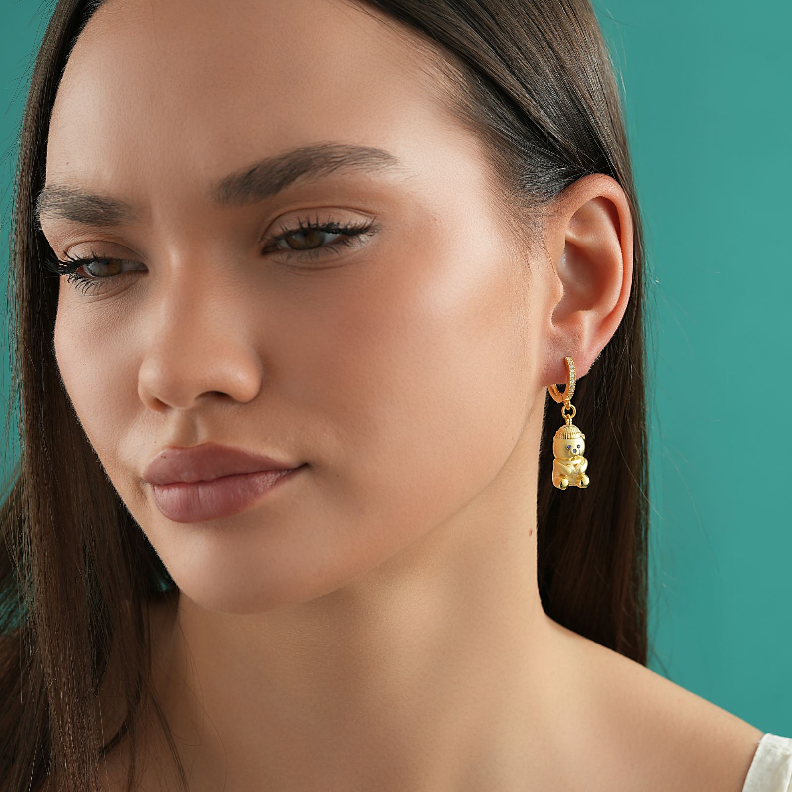 Model showcasing Gold Filled Bear Earrings, crafted in Sterling Silver, with a gold finish.