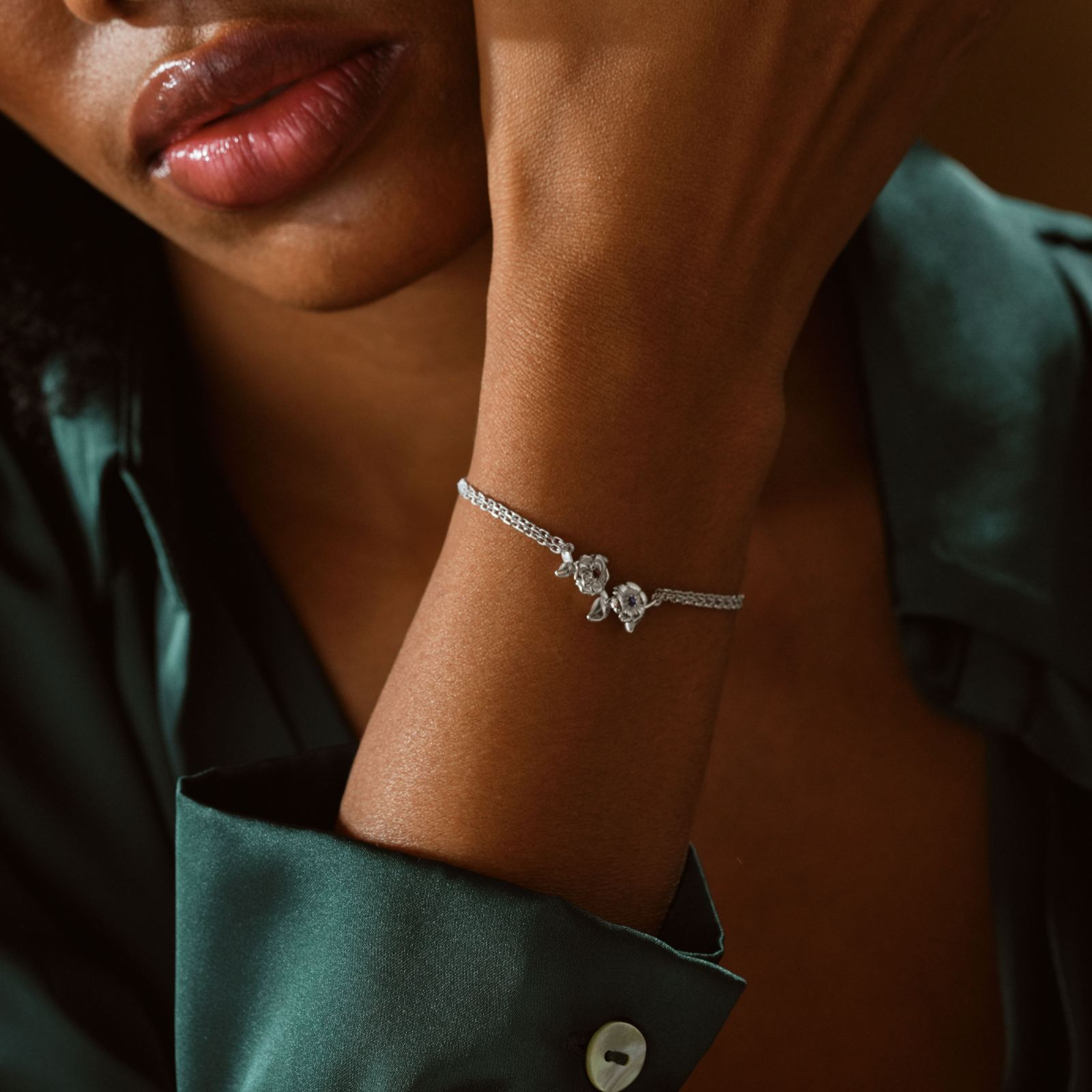 Custom 3D Birth Flower Bracelet worn on a woman's wrist showcasing the elegant design and sterling silver material.