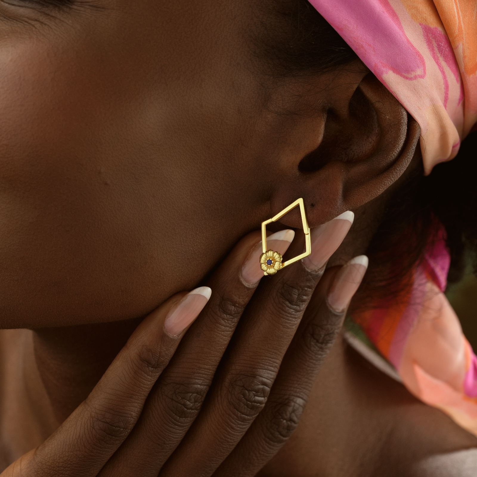 Charming Birth Flower Ear Jacket Earrings showcased on model, highlighting the design and floral detail in a vibrant setting.