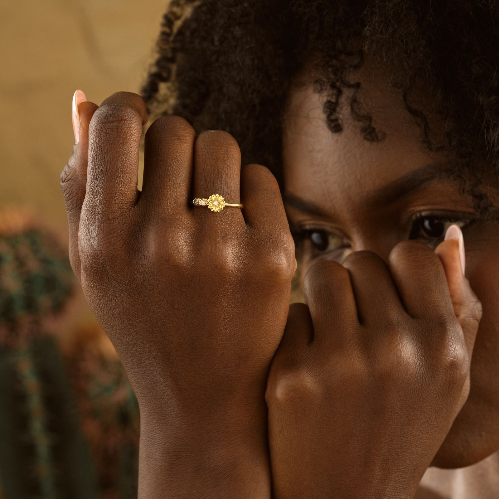 Custom Birth Flower Ring with Birthstone worn on hand, featuring a floral design and sparkling birthstone.