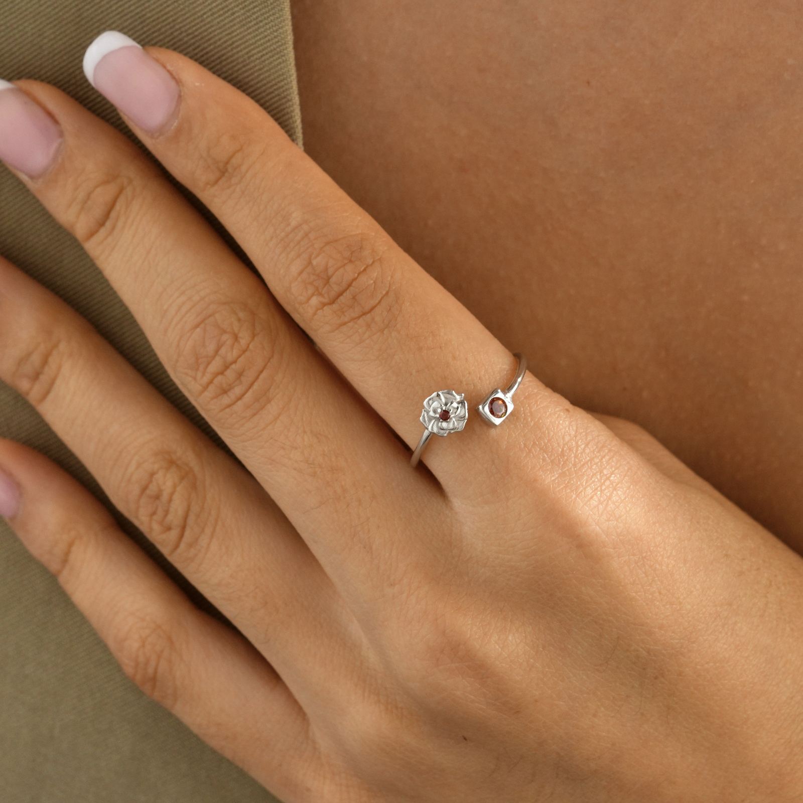 Adjustable Open Ring worn on a hand, showcasing the unique design and high-quality sterling silver finish.
