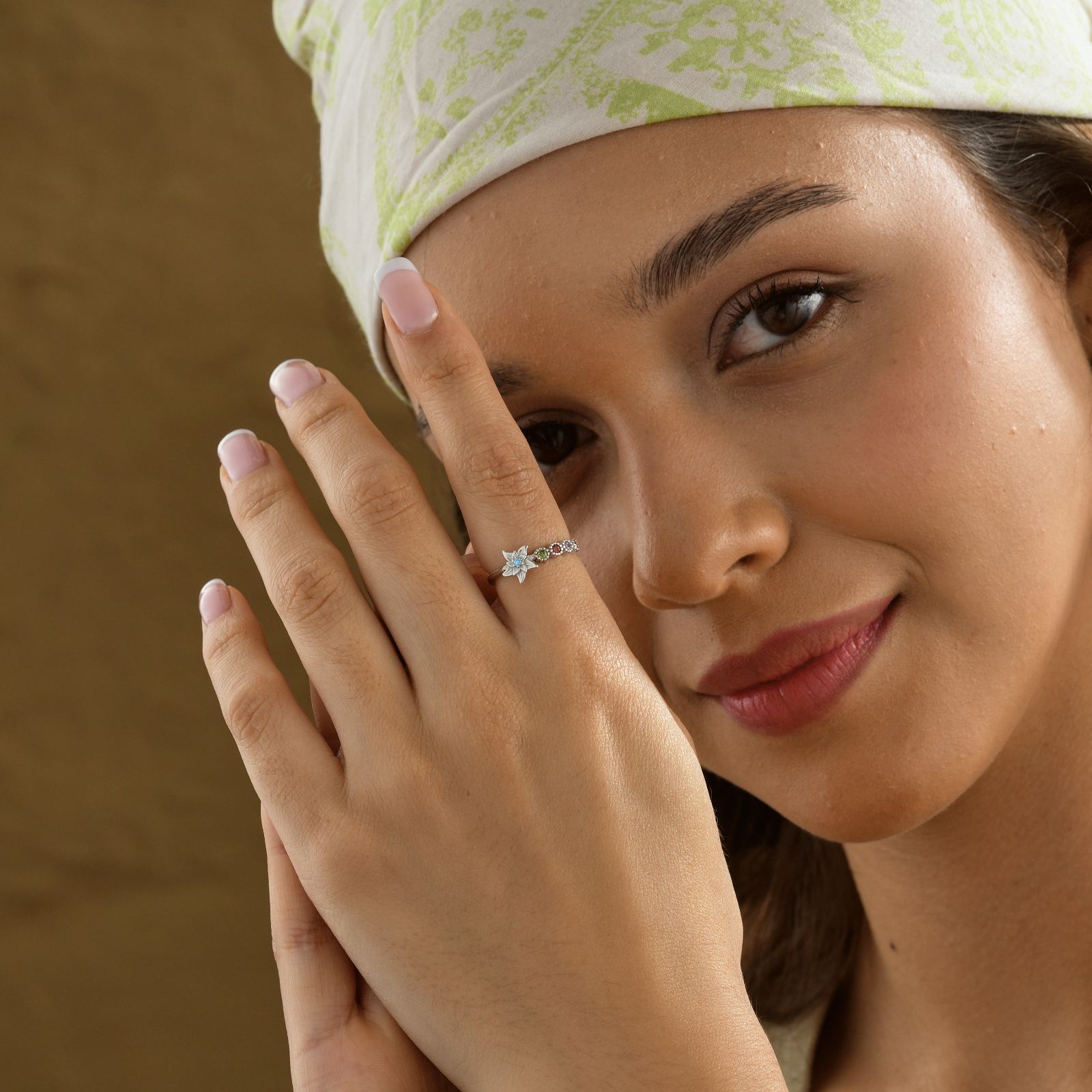 Custom Birth Flower Ring with Birthstone worn by a woman, showcasing the beautiful design and gemstone.