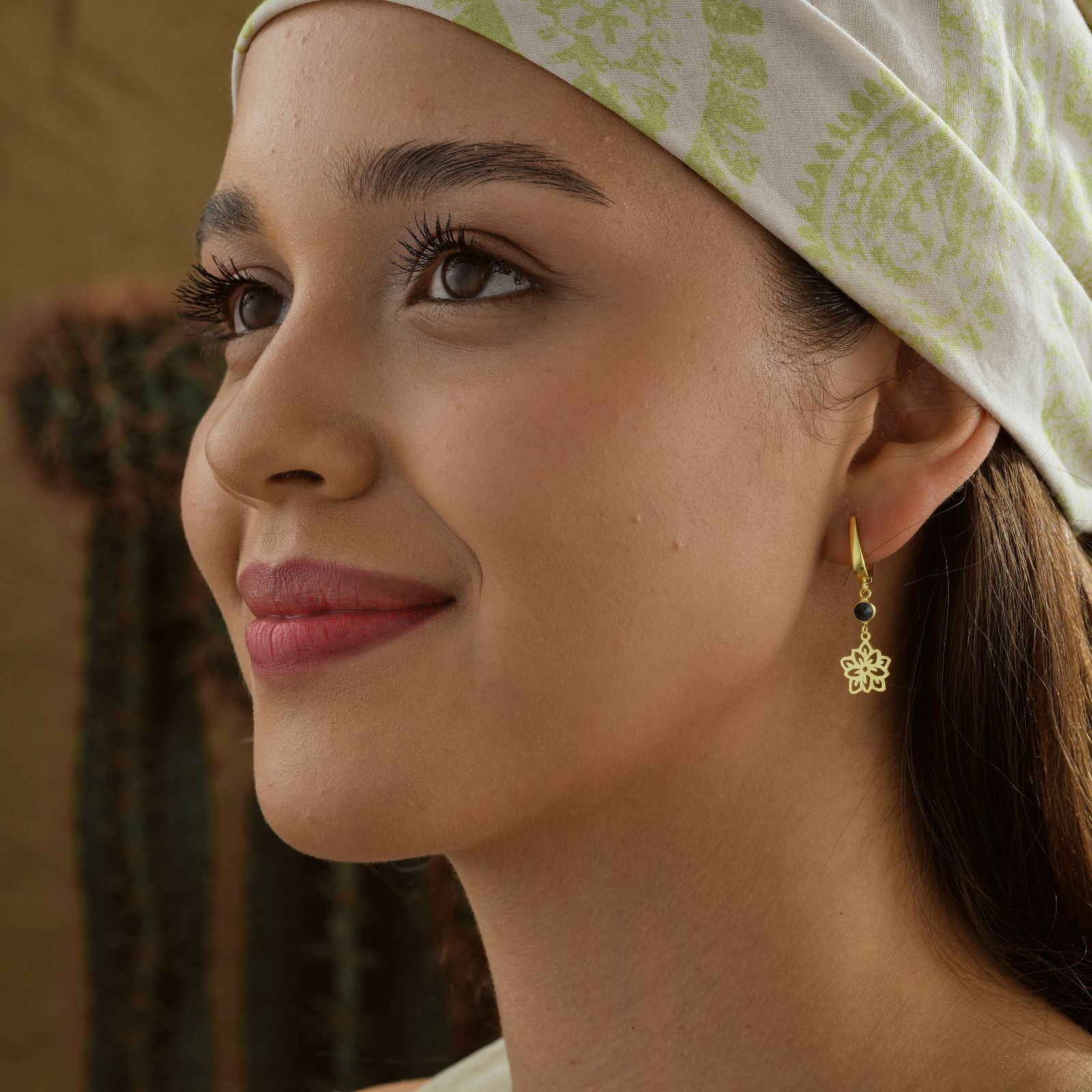 Birthflower Drop Earrings with Birth Stone worn by a model showcasing elegant design and craftsmanship.
