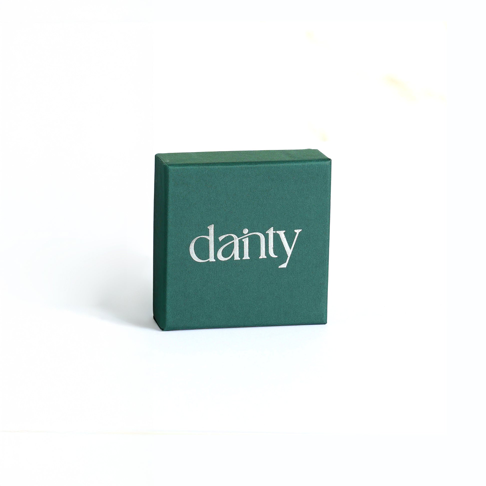 Dainty Luxury Slide Drawer Jewelry Box in sleek green packaging with elegant logo.