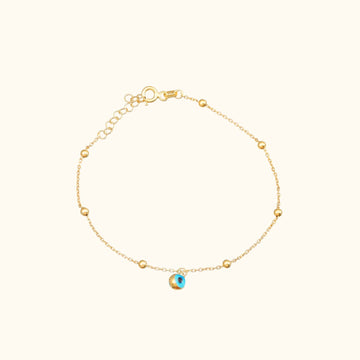 Charming Evil Eye Bracelet Sterling Silver with gold vermeil finish and lobster claw closure.