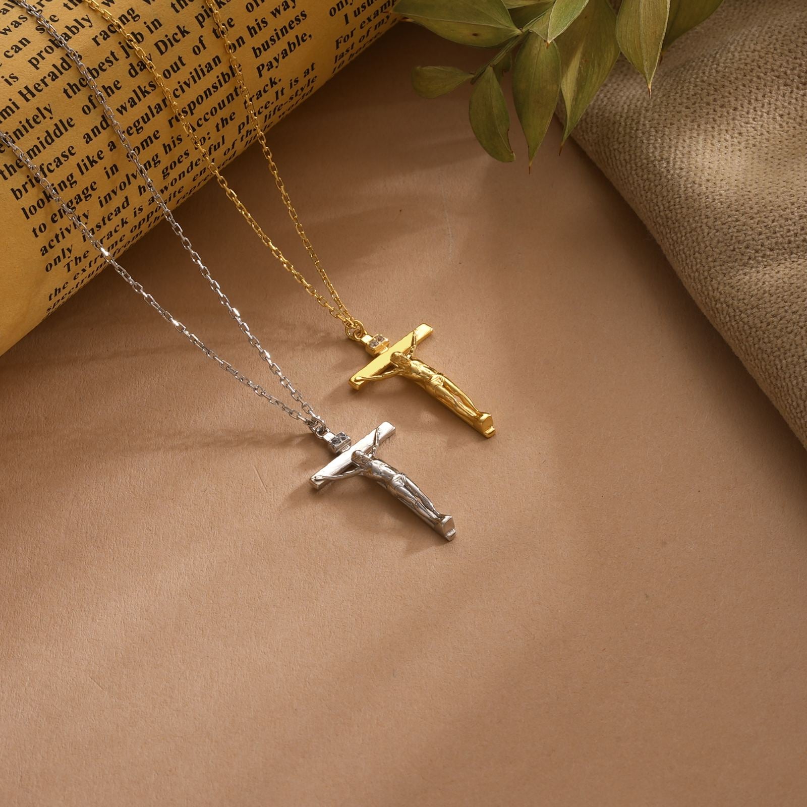 Gold Filled Crucifix Necklace with silver and gold crosses on a neutral background.