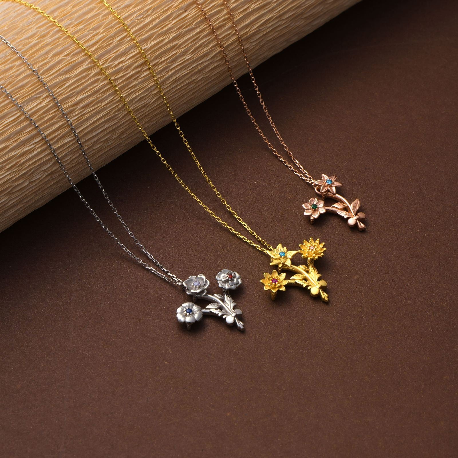 Gold Filled Birth Flower Bouquet Necklace collection featuring gold, rose gold, and silver floral designs.