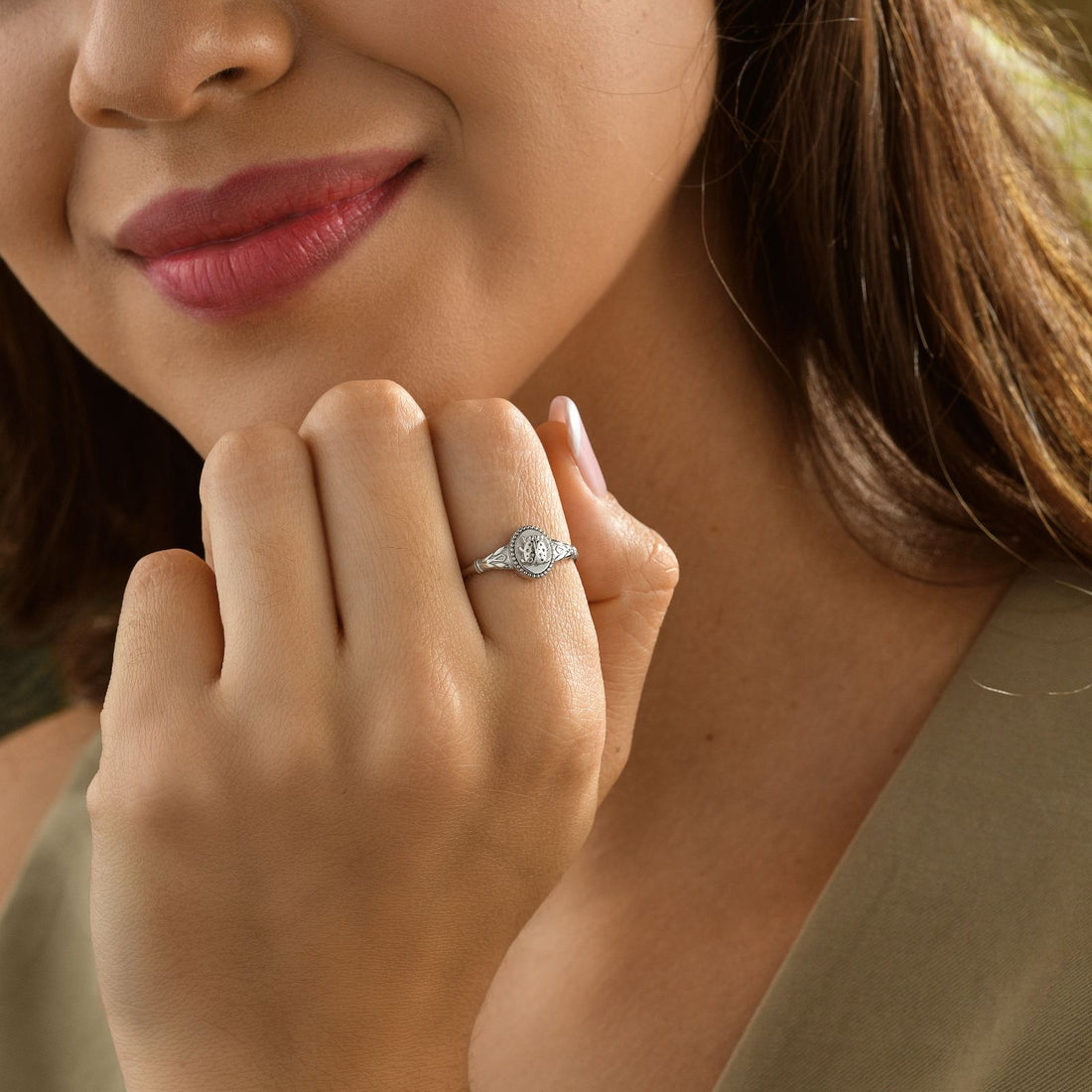 Ladybug Signet Ring - Animal Signet Ring worn on model's hand, showcasing its design in natural light.