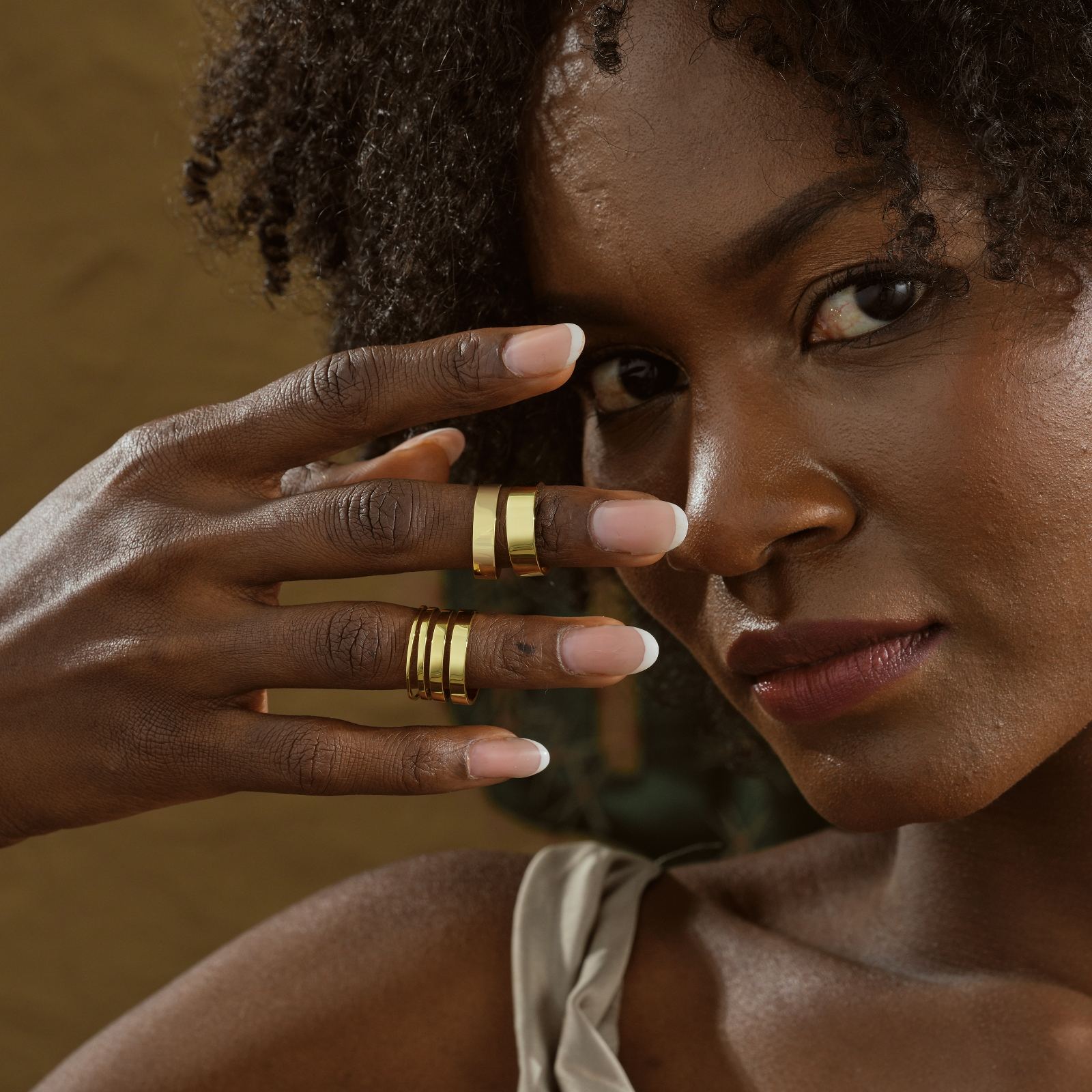 Thin Wedding Band Minimalist Stacking Ring worn on fingers with elegant nail design.