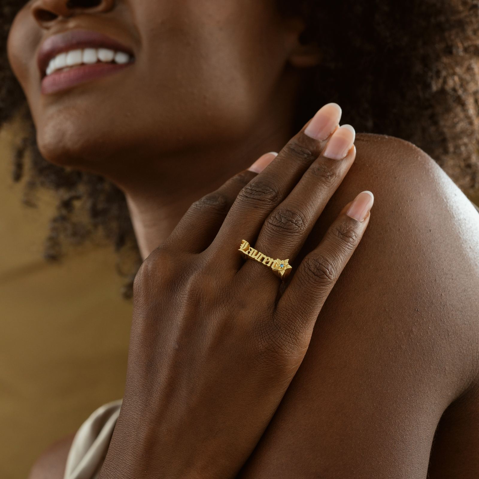 Gothic Style Name Ring with Birth Flower worn on hand, featuring gold vermeil finish and elegant design.