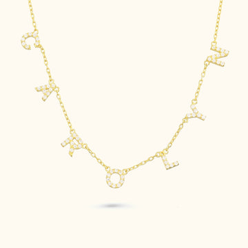Personalized Tiny Initial Necklace featuring sparkling cubic zirconia letters in gold vermeil finish.