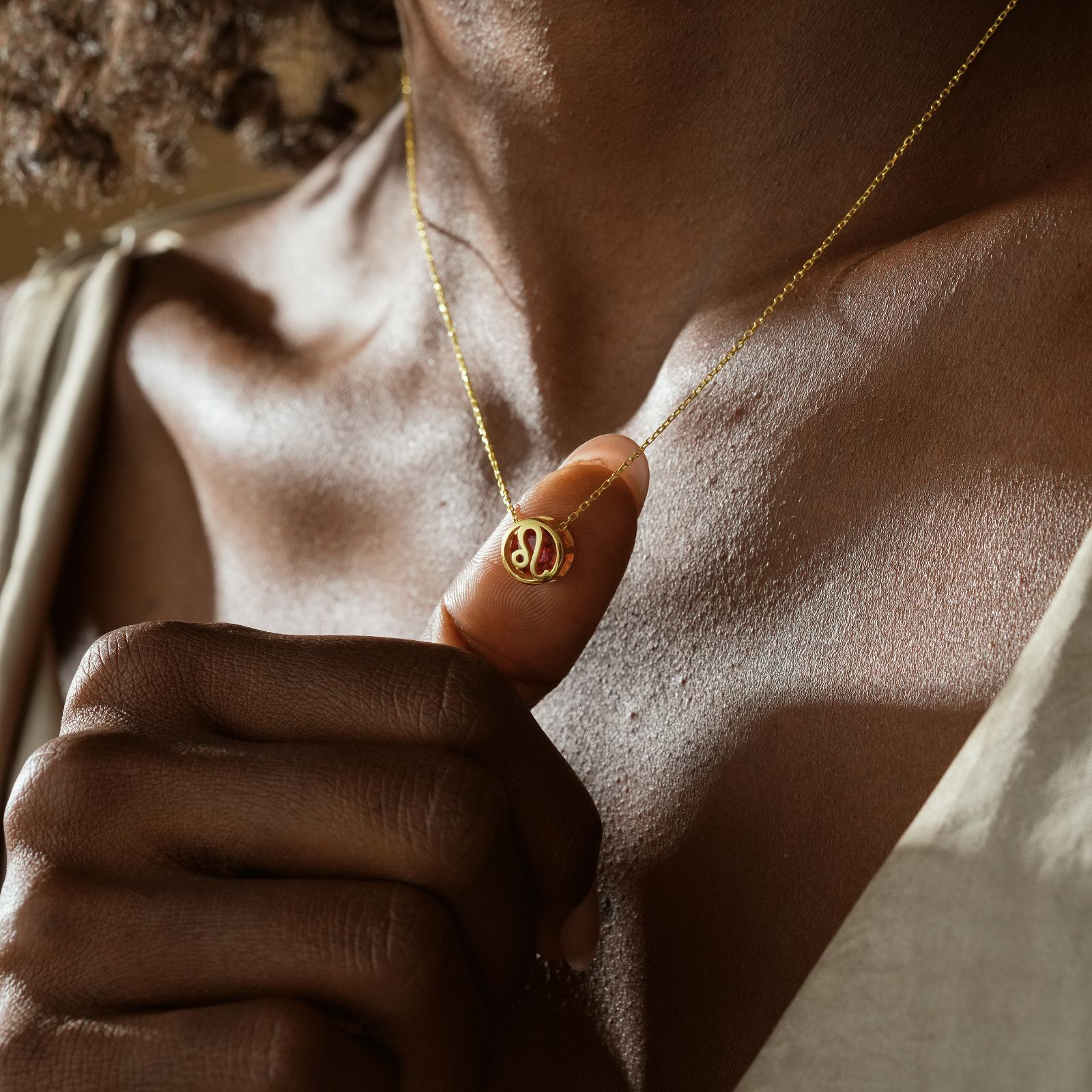 Zodiac Constellation Necklace featuring a gold-plated design worn on a model, perfect for astrology lovers.